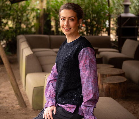 Lilac floral pattern fabric, also shown on model with black vest